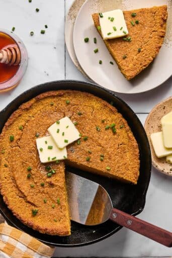 Almond Flour Pumpkin Cornbread! This simple & delicious grain-free bread is quick to make & delicious! Refined sugar free, fluffy, soft with a hint of cinnamon. Bake it in a skillet or baking pan for a hearty & flavorful side! Gluten Free + Low Calorie