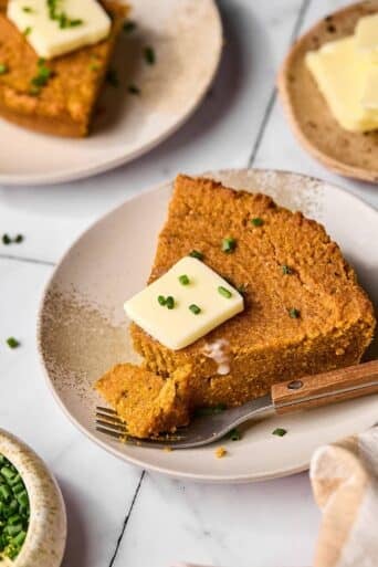 Almond Flour Pumpkin Cornbread! This simple & delicious grain-free bread is quick to make & delicious! Refined sugar free, fluffy, soft with a hint of cinnamon. Bake it in a skillet or baking pan for a hearty & flavorful side! Gluten Free + Low Calorie