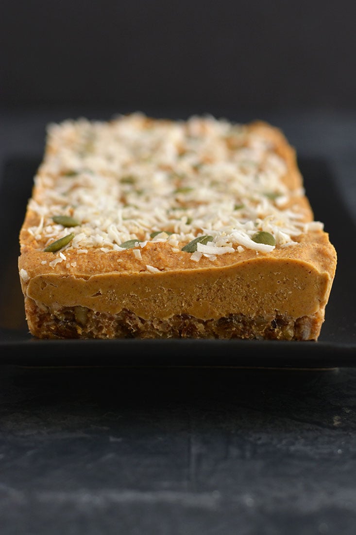 Raw Pumpkin Pie! Made with a walnut, date base & topped with a creamy, cashew pumpkin custard, this is what pumpkin pie dreams are made of. No baking required! Serve as a dessert or healthy snack. Paleo + Vegan + Low Calorie
