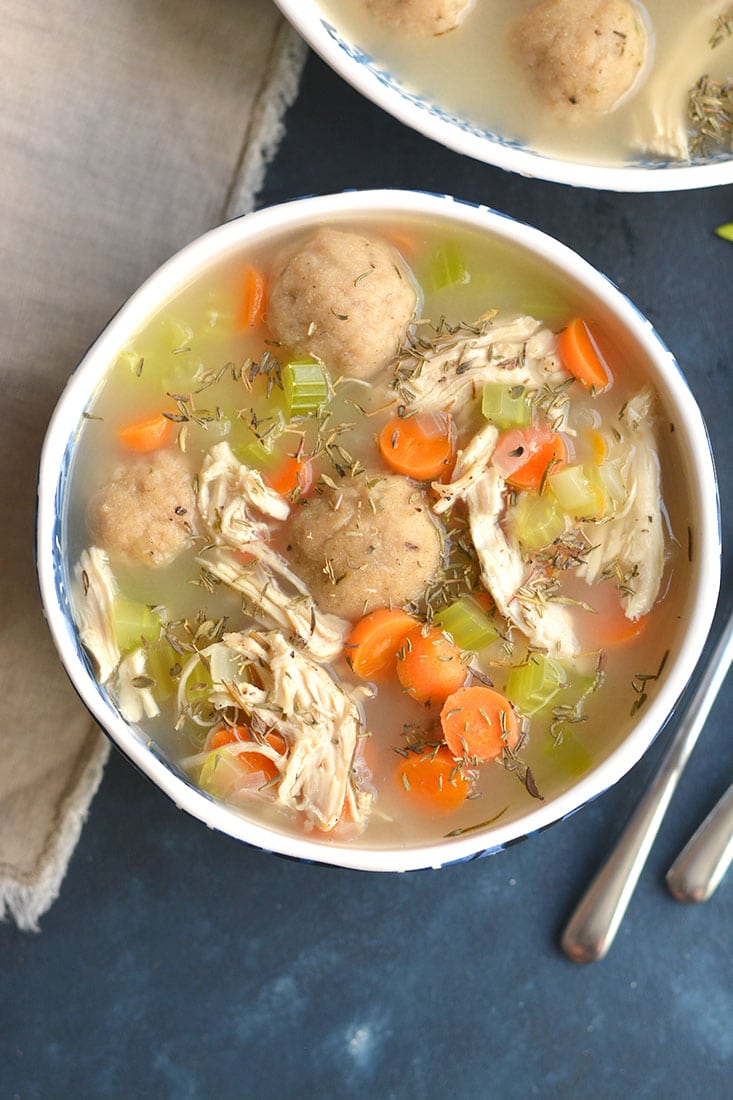 Healthy Chicken Dumpling Soup! Gluten Free dumplings snuggled in a warm bowl of chicken soup. Cozy, comforting, loaded with veggies & flavor. A quick & easy meal to feed the soul. Gluten Free + Low Calorie