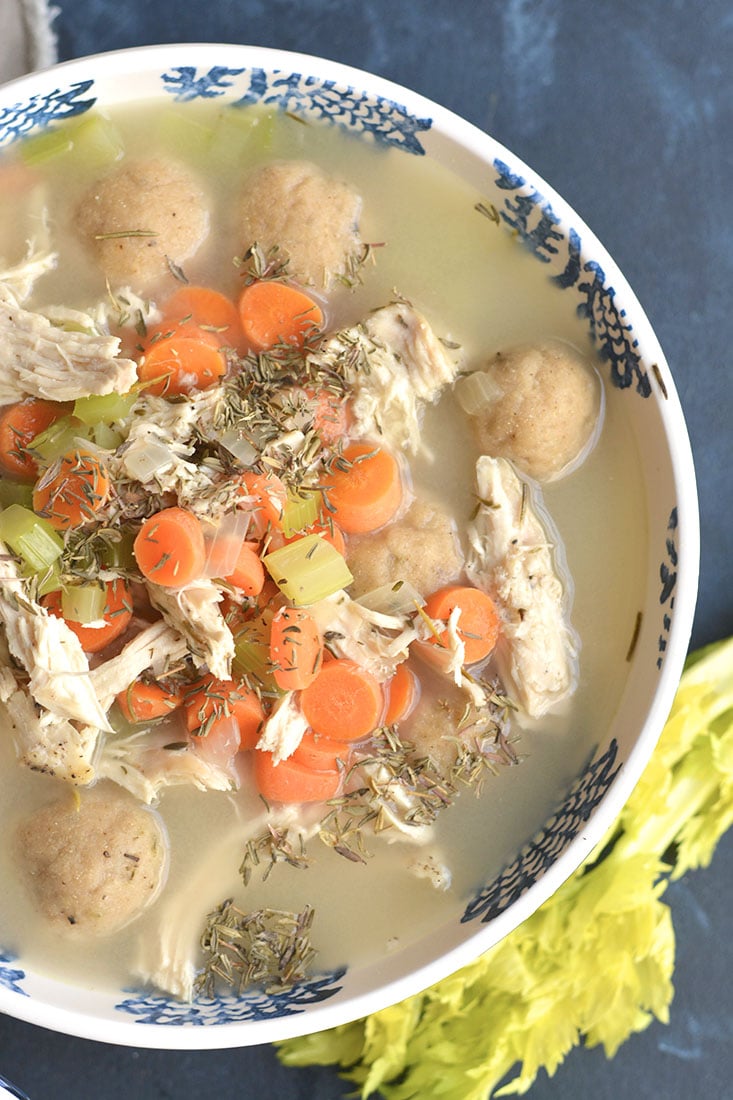 Healthy Chicken Dumpling Soup! Gluten Free dumplings snuggled in a warm bowl of chicken soup. Cozy, comforting, loaded with veggies & flavor. A quick & easy meal to feed the soul. Gluten Free + Low Calorie