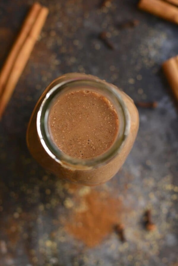 Skinny Gingerbread Coffee Creamer! This vegan coffee creamer recipe makes a decadent, smooth creamer at home! Easy to make on the stove top with simple, dairy free ingredients. Gluten Free + Vegan + Paleo + Low Calorie