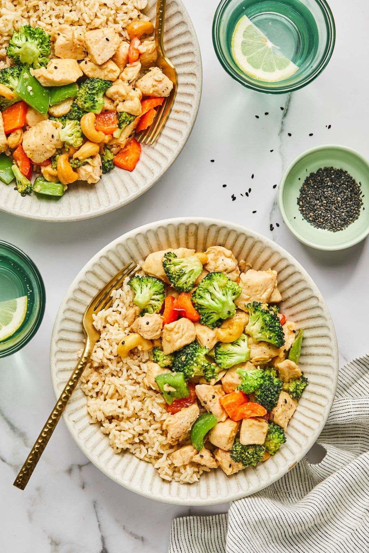 Two bowls of healthy cashew chicken recipe.