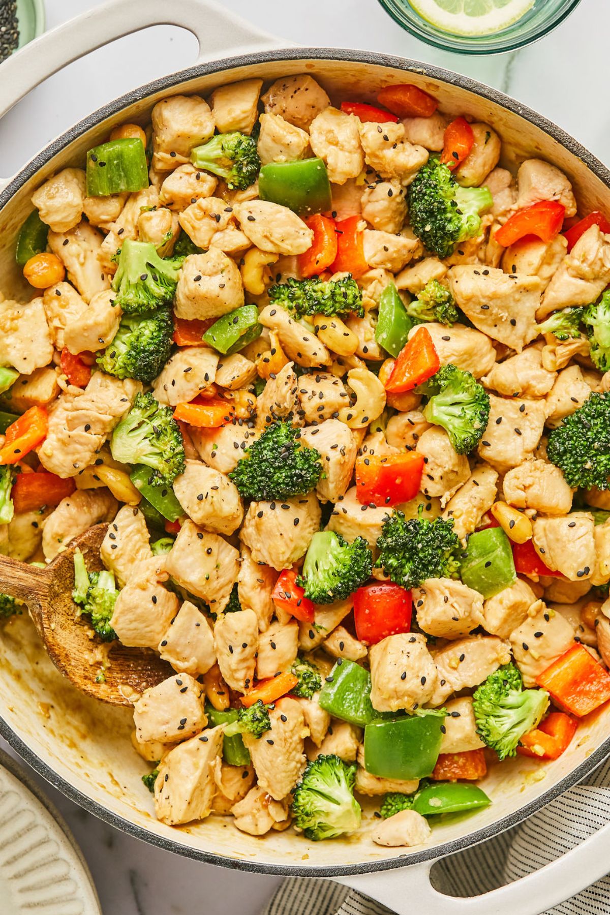 Healthy cashew chicken in a skillet.