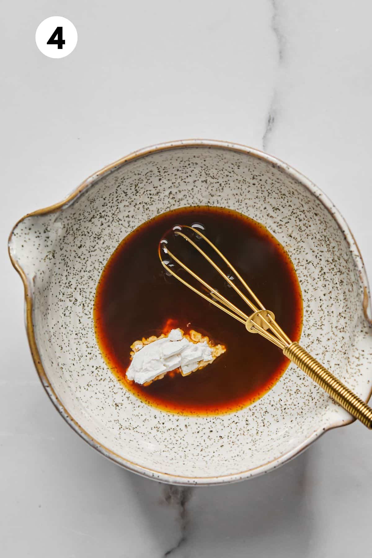 Sauce for cashew chicken in a skillet.