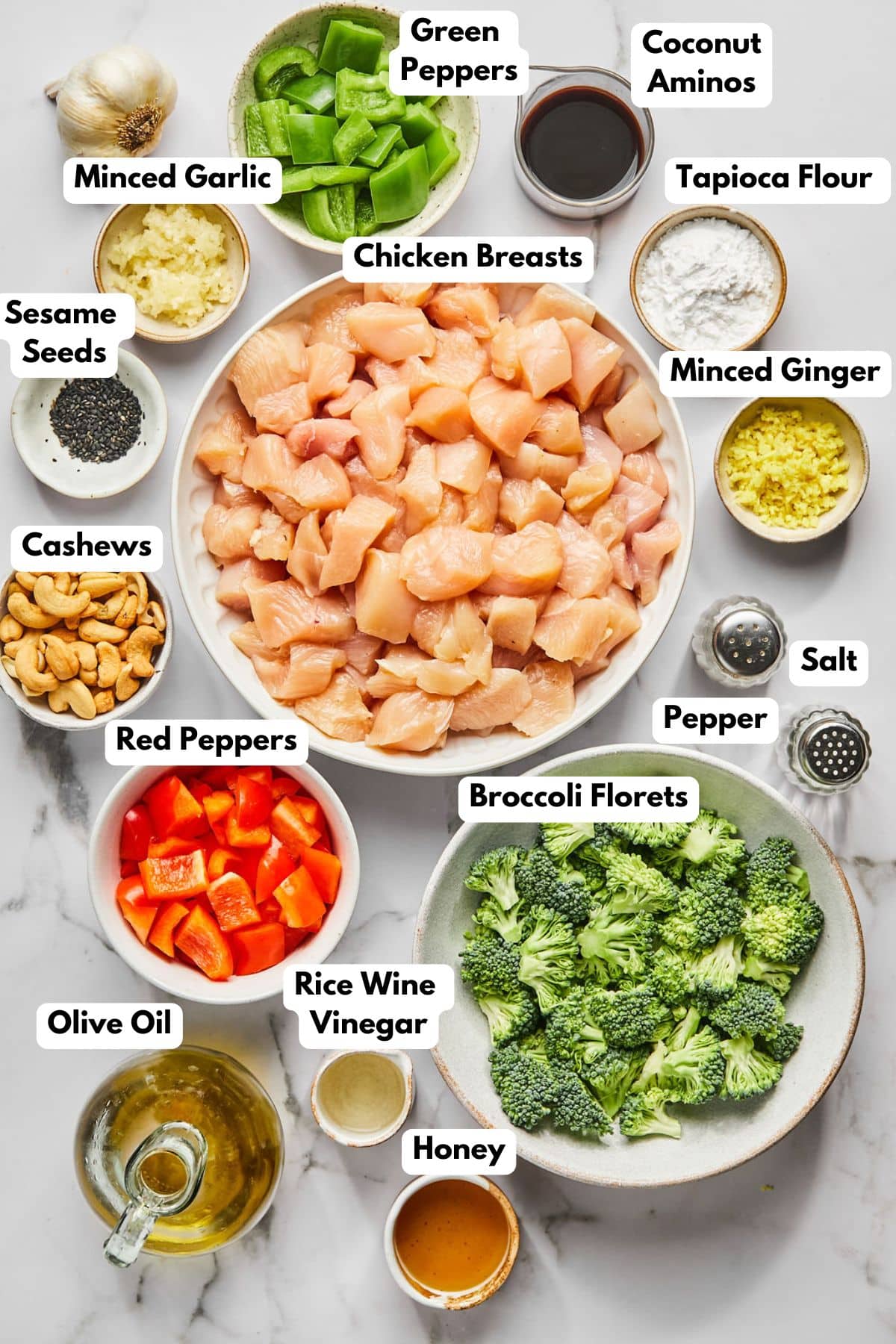 Ingredients for making cashew chicken in bowls.