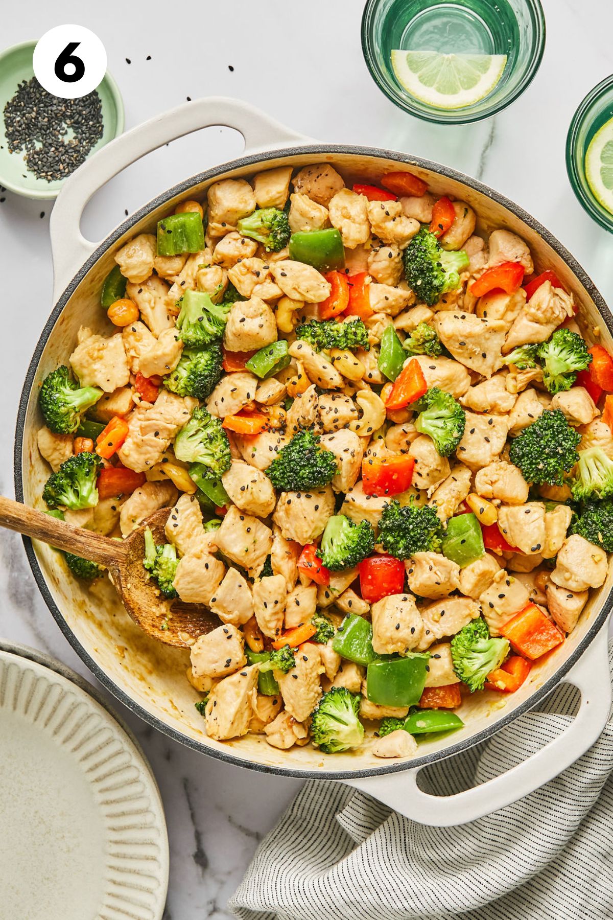 Cooked cashew chicken in a skillet.