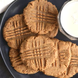 5 Ingredient Low Carb Peanut Butter Cookies! Made grain, sugar and oil free, these Keto cookies are a healthier version of a childhood favorite! Gluten Free + Low Carb + Keto + Low Calorie