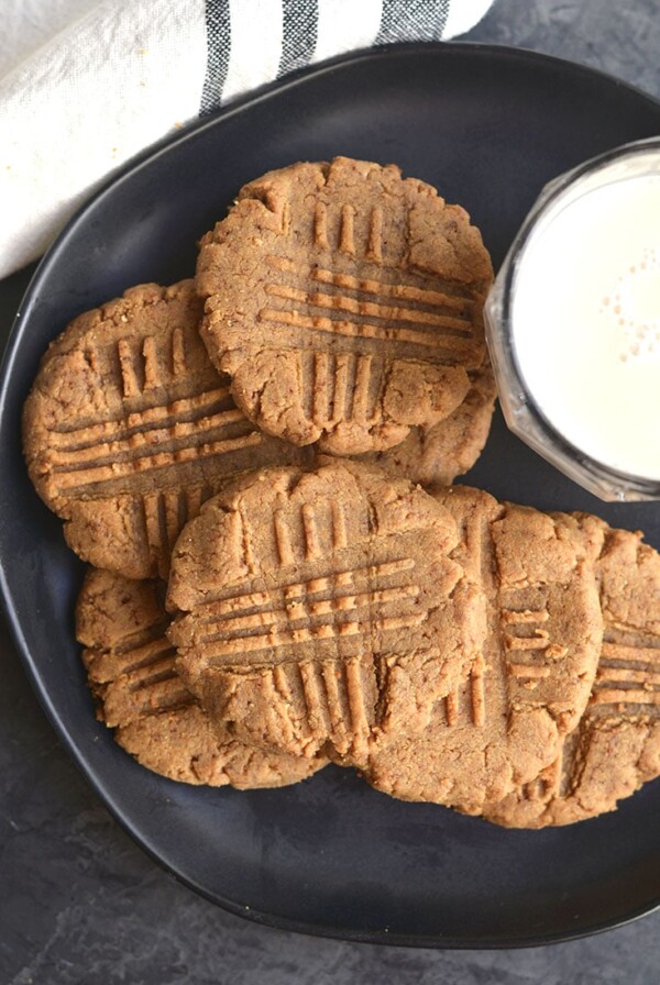 5 Ingredient Low Carb Peanut Butter Cookies! Made grain, sugar and oil free, these Keto cookies are a healthier version of a childhood favorite! Gluten Free + Low Carb + Keto + Low Calorie