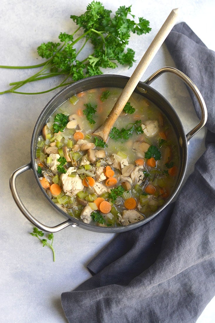 Chicken Wild Rice Soup is a flavorful meal in a bowl. Packed with veggies, protein and wild "rice" to fill you up this season. Easy to make & crowd pleasing! Gluten Free + Low Calorie