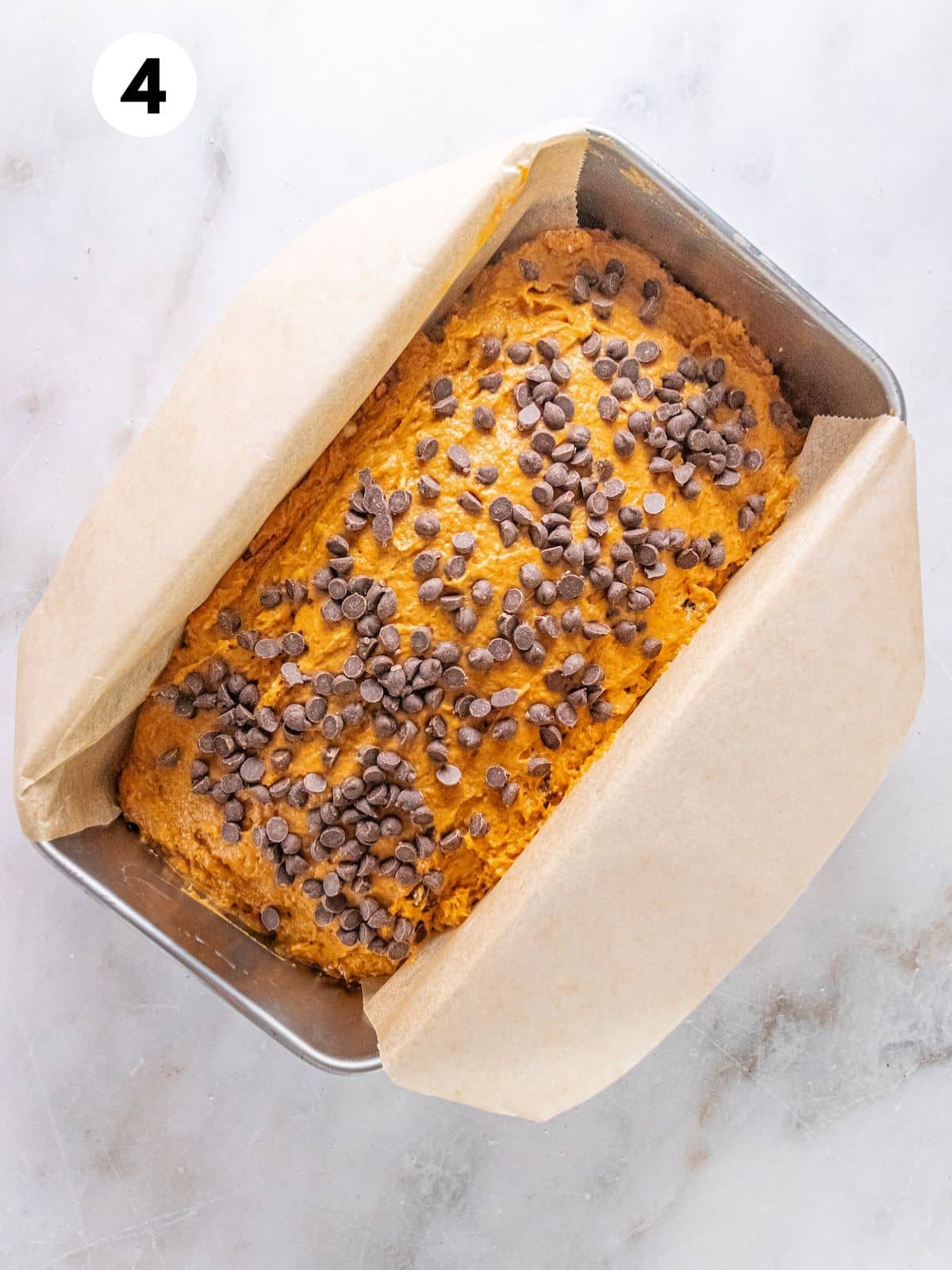 Baked chocolate gingerbread loaf cake in the pan.