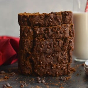 Gingerbread chocolate cake with five slices stacked on each other.