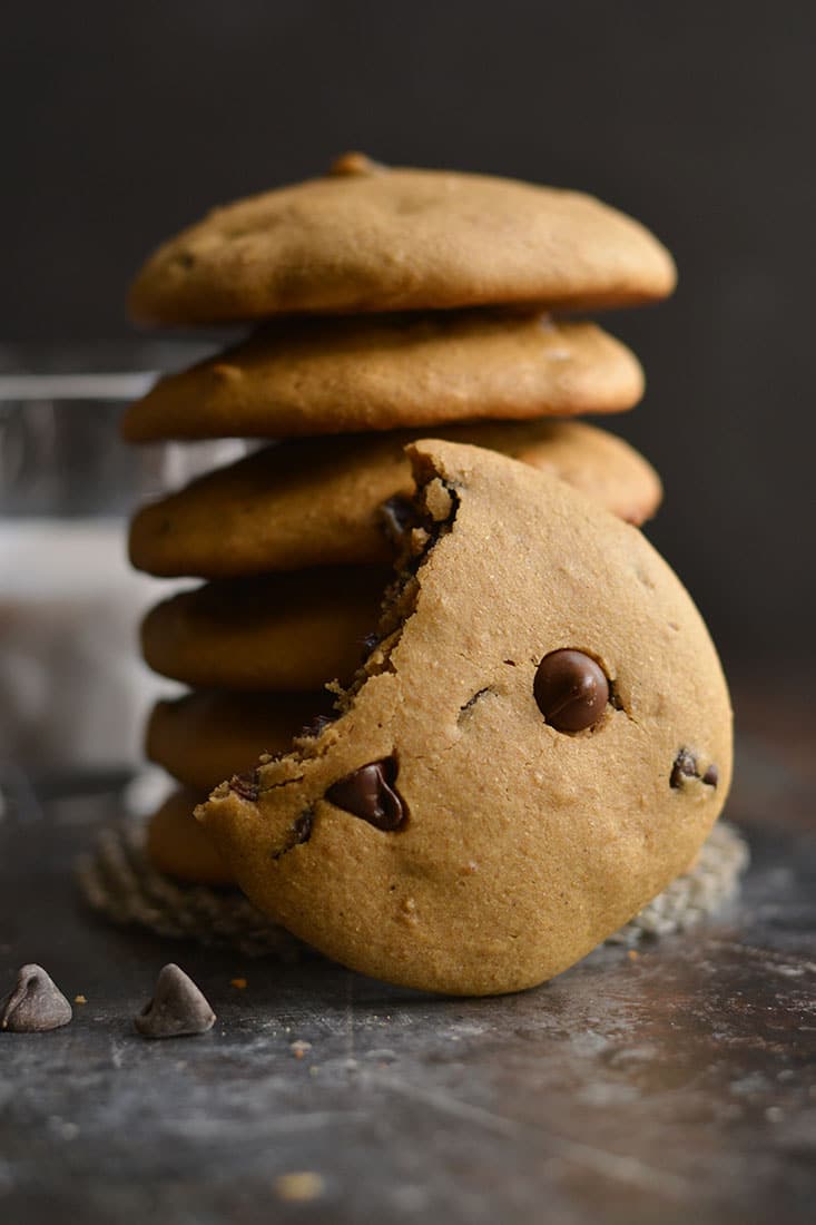 Low Calorie Gluten Free Chocolate Chip Cookies! Perfectly soft baked cookies made with real food ingredients! A healthier version of a childhood favorite made without any refined oil or sugar. Gluten Free + Low Calorie