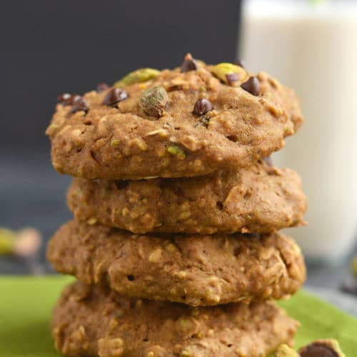 Thick, chewy, Gluten Free Pistachio Chocolate Oatmeal Cookies! A healthier Christmas treat for 100 calories that's even healthy for breakfast. Only 10 minutes to make! Gluten Free + Low Calorie