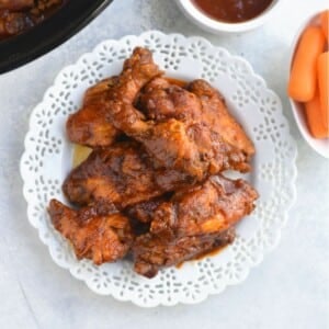 Crockpot BBQ chicken wings on a plate.