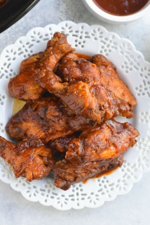 Crockpot BBQ chicken wings on a plate.