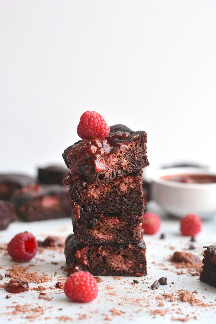 Paleo Raspberry Cacao Brownies! Made gluten free, dairy free and nut free! A deliciously sinful tasting dessert that's healthy and quick to make! Top with a raspberry chocolate sauce for more chocolatey goodness! Paleo + Gluten Free + Low Calorie
