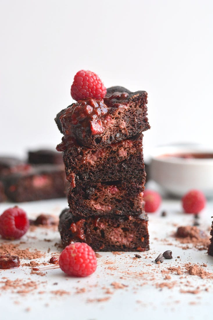 Paleo Raspberry Cacao Brownies! Made gluten free, dairy free and nut free! A deliciously sinful tasting dessert that's healthy and quick to make! Top with a raspberry chocolate sauce for more chocolatey goodness! Paleo + Gluten Free + Low Calorie