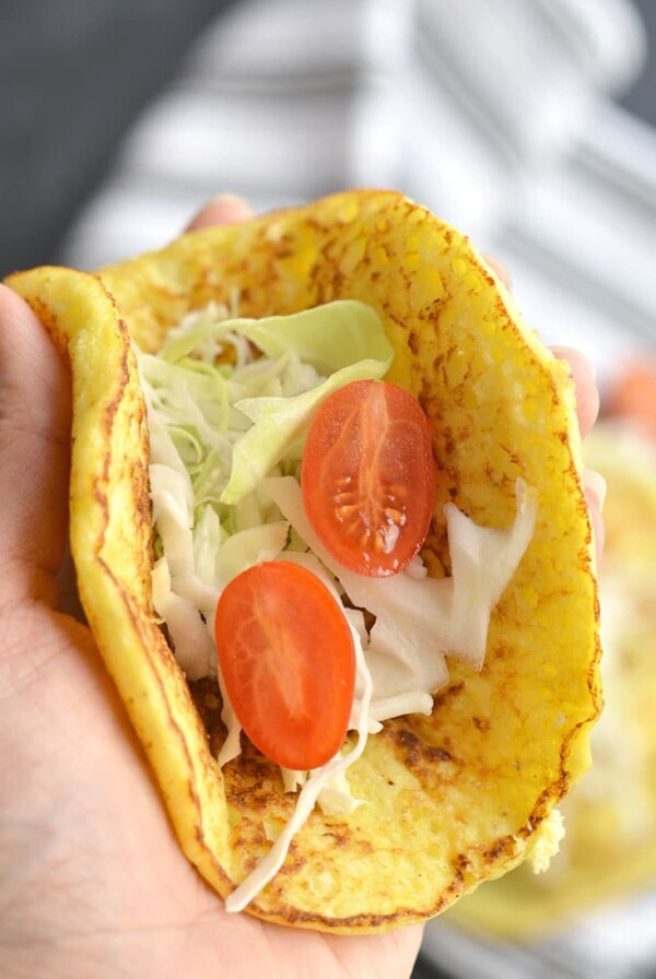 Homemade 3-ingredient Cauliflower Tortillas! Made with eggs, cauliflower and garlic, these grain-free tortillas are easy to make and customizable. They are perfect as a gluten free substitute for wraps and tortillas. They also double as breakfast fritters. Gluten Free + Paleo + Low Carb + Low Calorie