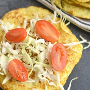 Homemade 3-ingredient Cauliflower Tortillas! Made with eggs, cauliflower and garlic, these grain-free tortillas are easy to make and customizable. They are perfect as a gluten free substitute for wraps and tortillas. They also double as breakfast fritters. Gluten Free + Paleo + Low Carb + Low Calorie