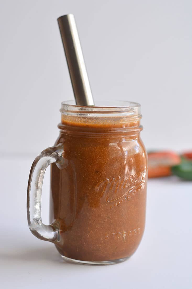 This Healthy Enchilada Sauce is made with homemade with wholesome, everyday ingredients. A simple to make, 10 minute enchilada sauce made easy on the stovetop with minimal work. Naturally gluten free, Paleo and low in calories. Perfect for topping enchiladas, tacos, burritos, salads and more! 