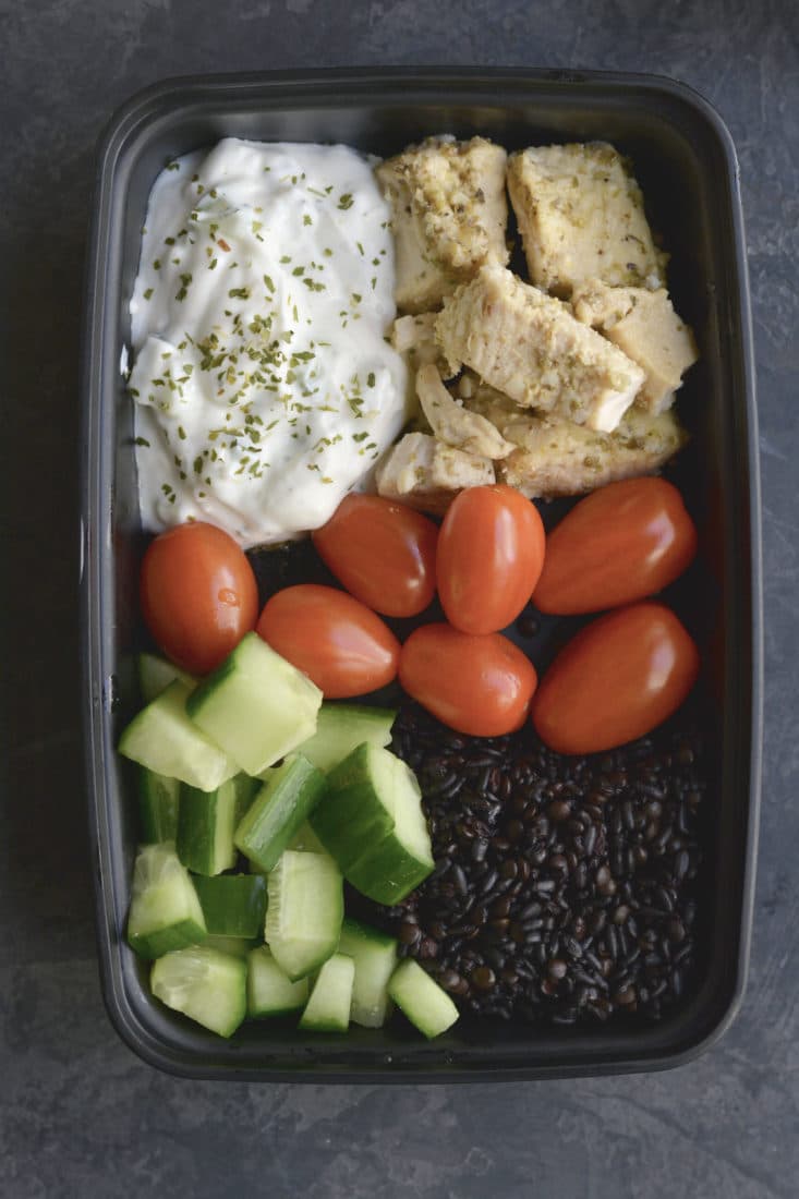 Meal Prep Greek Chicken Quinoa! Made in under 30 minutes in an Instant Pot. Paired with quinoa, tzatziki, cucumber and tomatoes for a Mediterranean style meal that is filling and full of flavor! Gluten Free + Low Calorie