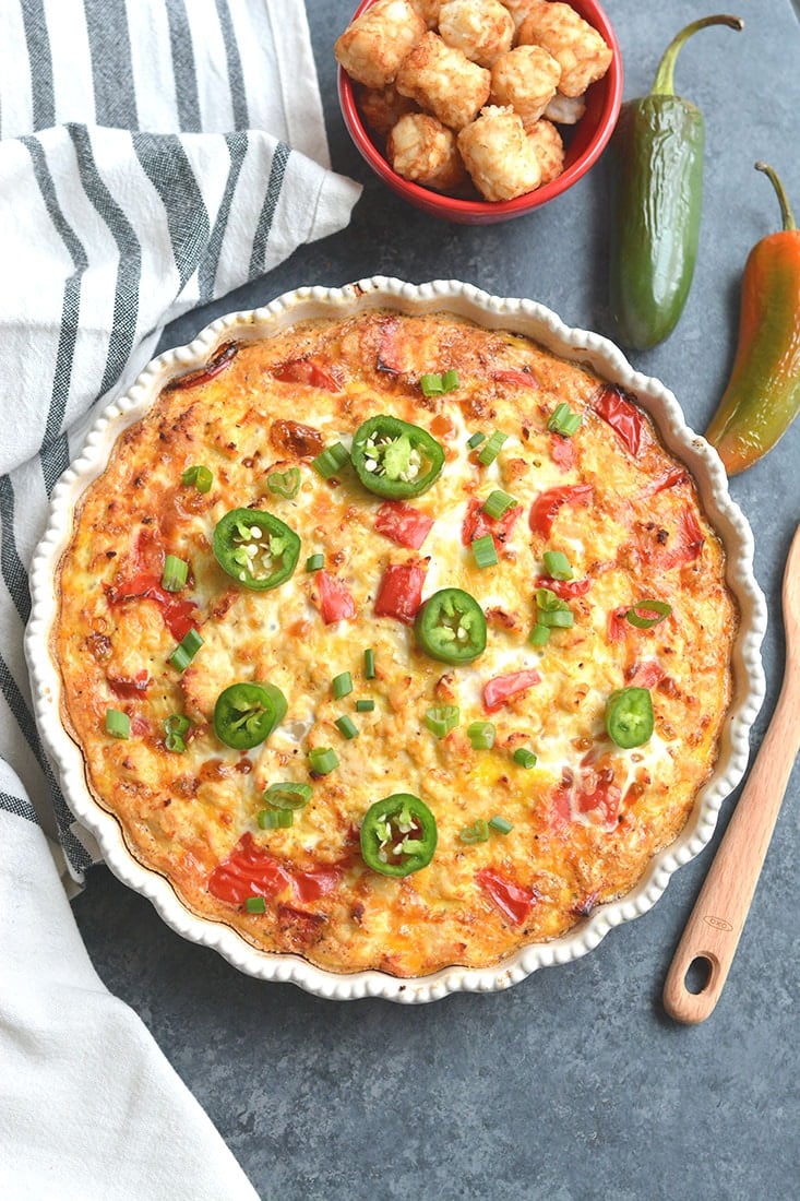 Tater Tot Breakfast Bake! Loaded with chicken, eggs, bell pepper & tater tots, this recipe is simple to make, hearty & tasty. Perfect for a weekend brunch and feeds a crowd too! Gluten Free + Low Calorie