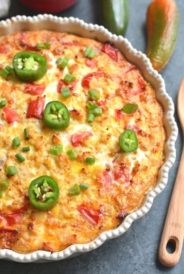 Tater Tot Breakfast Bake! Loaded with chicken, eggs, bell pepper & tater tots, this recipe is simple to make, hearty & tasty. Perfect for a weekend brunch and feeds a crowd too! Gluten Free + Low Calorie