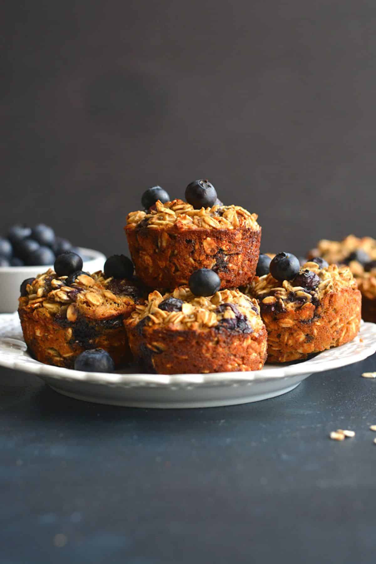 A plate of blueberry oatmeal protein muffins.