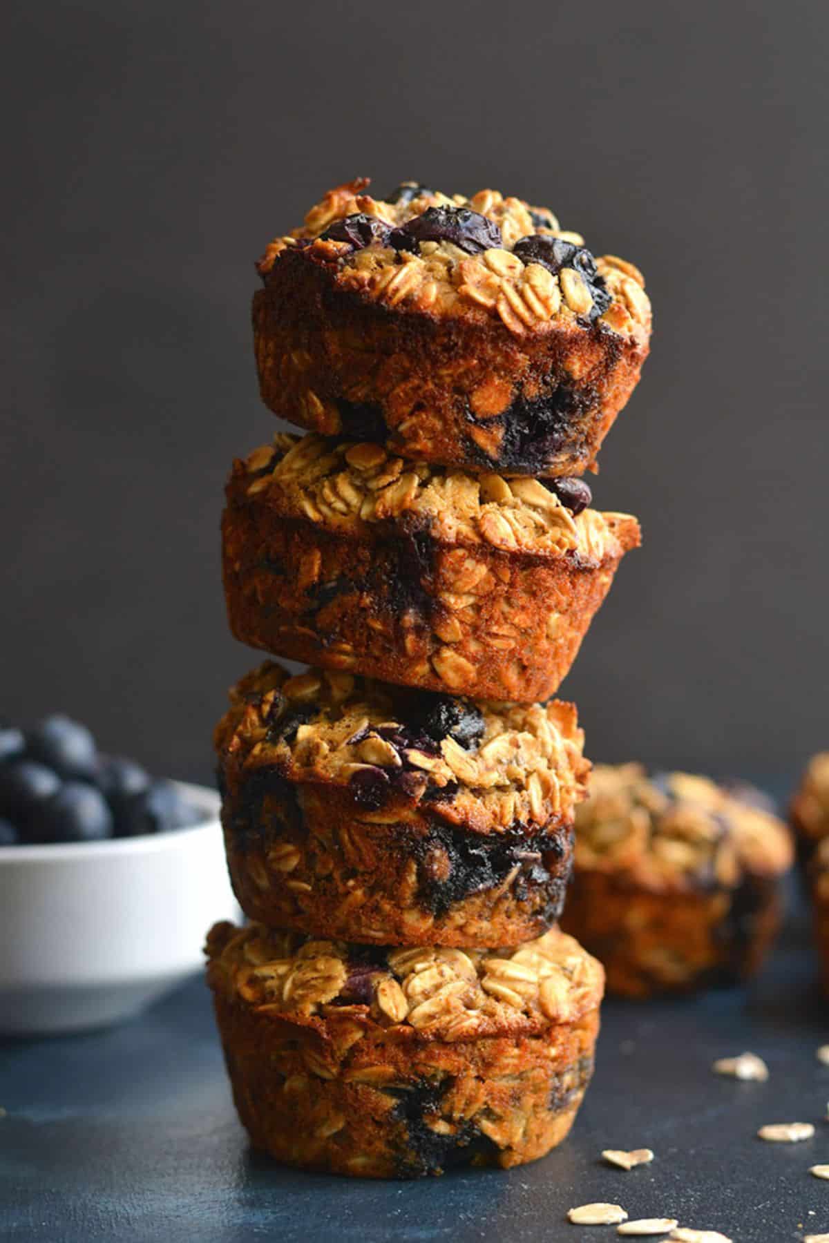A stack of blueberry protein oatmeal muffins.