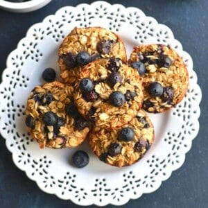 A plate of blueberry oatmeal protein muffins.