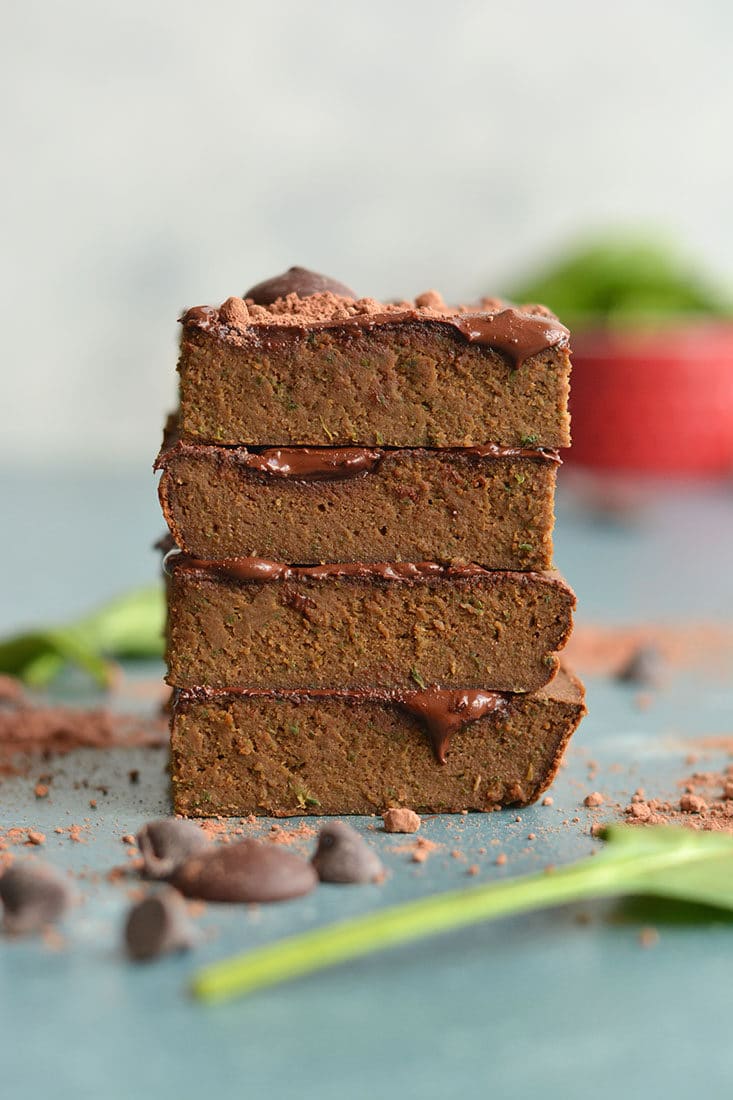 Super Sneaky Spinach Brownies! These gluten free brownies are chewy, chocolatey, low in sugar and packed with hidden veggies. Great for picky eaters because you can't even taste it! Gluten Free + Low Calorie