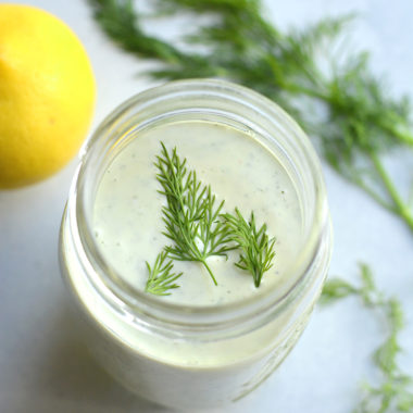 Greek Yogurt Ranch Dressing! This lightened up dressing is low in fat and calories and higher in protein. Made mayo free making this a healthier, waist friendly salad dressing. Top on salads, sandwiches or serve as a dip. Gluten Free + Low Calorie