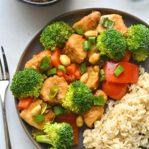 Instant Pot Healthy Kung Pao Chicken is low calorie, lightened up and made with real food ingredients. 15 minutes to make in an Instant Pot! Perfect for a quick weeknight dinner, or weekend meal prepping!