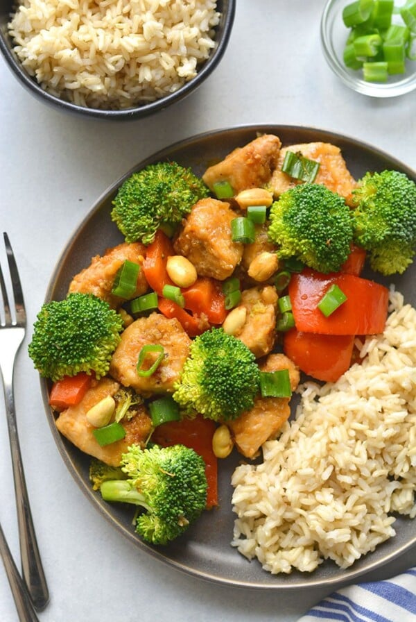 Instant Pot Healthy Kung Pao Chicken is low calorie, lightened up and made with real food ingredients. 15 minutes to make in an Instant Pot! Perfect for a quick weeknight dinner, or weekend meal prepping!