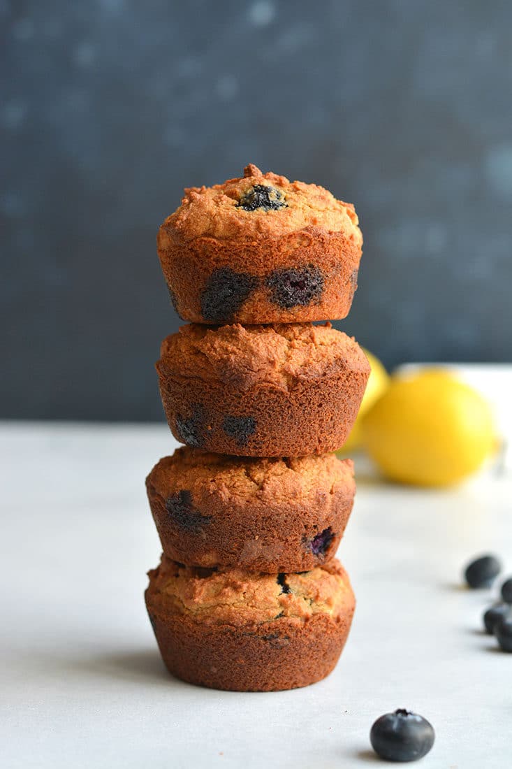 Almond Flour Blueberry Muffins! Fuffy, low carb, Paleo muffins lightened up and packed with antioxidant rich blueberries. A high protein breakfast or snack muffin that's nutritious and delicious! Paleo + Low Carb + Gluten Free