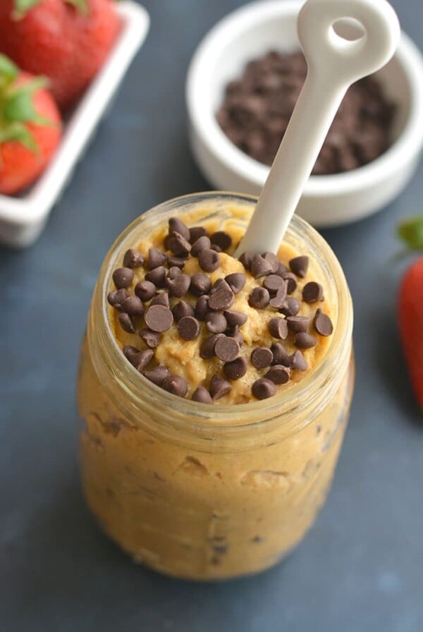 Protein Chickpea Cookie Dough! This eggless no bake cookie dough is made in a blender with chickpeas and protein powder. Low in sugar, refined sugar free and dairy free, this goodie makes the perfect healthy snack treat for anytime of day. Vegan + Gluten Free + Low Calorie