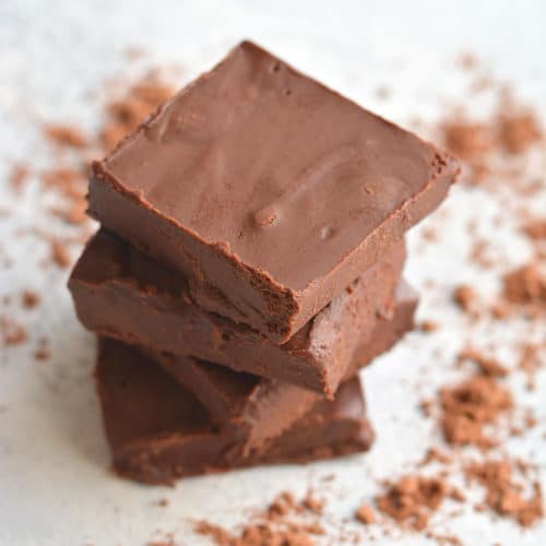 Collagen Fudge Brownies made with 6 healthy ingredients. Loaded with protein, healthy fat and antioxidants, these super fudgy brownies are a healthier treat that's great for weight loss. They make a delicious low carb addition to your freezer and belly! Paleo + Low Carb + Gluten Free