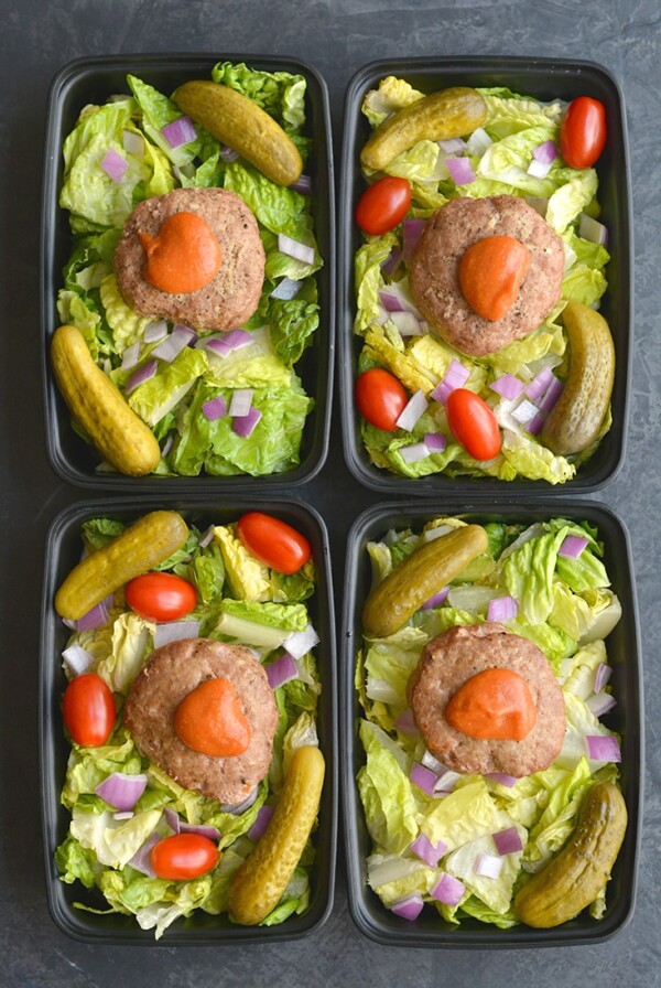 Meal Prep Turkey Burger Salad! Stuffed with parmesan and garlic then baked on a sheet pan. These burgers make the most flavorful, delicious burgers. Simple to make, gluten free and low carb! Paired with a salad and ketchup mustard dressing for a quick and easy meal prep! Gluten Free + Low Calorie + Low Carb