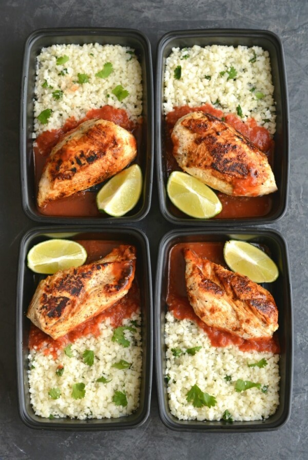 Meal Prep Margarita Chicken! This lightened up chicken is marinated and cooked in a skillet with spices. Paired with cilantro lime cauliflower rice and salsa for an EASY, low carb dinner or lunch. Perfect for busy week days! Low Carb + Paleo + Low Calorie + Gluten Free 