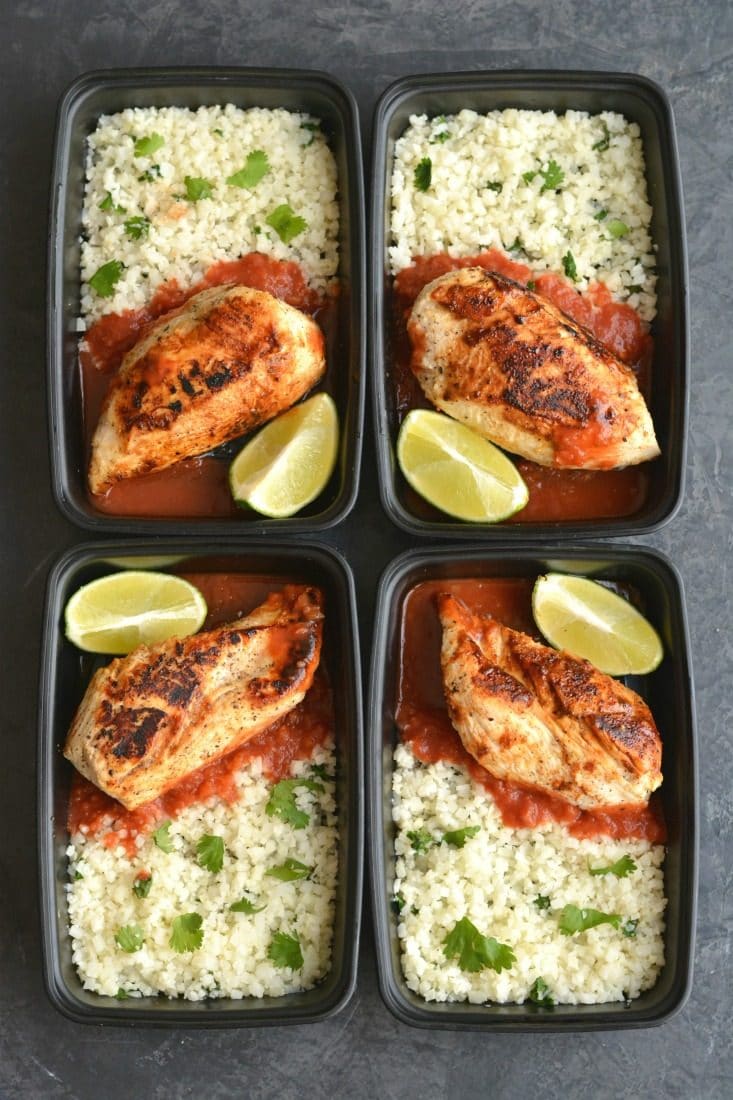 Meal Prep Margarita Chicken! This lightened up chicken is marinated and cooked in a skillet with spices. Paired with cilantro lime cauliflower rice and salsa for an EASY, low carb dinner or lunch. Perfect for busy week days! Low Carb + Paleo + Low Calorie + Gluten Free 