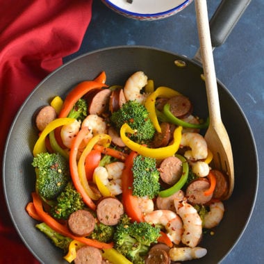 Spicy Shrimp Sausage Stir-Fry! An easy, 30-minute protein packed meal loaded with a rainbow of veggies. A meal you can feel good about feeding your family that tastes great too! Paleo + Gluten Free + Low Calorie!