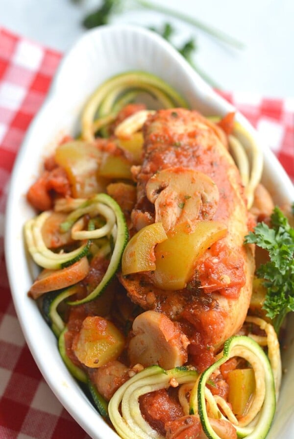 Crockpot Chicken Cacciatore! A healthy spin on traditional Italian cacciatore made in a slow cooker. Served over zucchini noodles for a minimal effort, low carb dinner that's big on flavor. Gluten Free + Paleo + Low Calorie + Low Carb