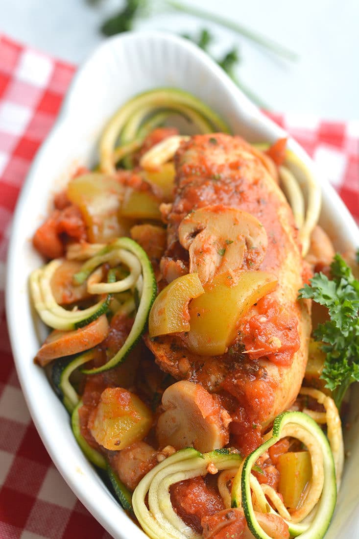 Crockpot Chicken Cacciatore! A healthy spin on traditional Italian cacciatore made in a slow cooker. Served over zucchini noodles for a minimal effort, low carb dinner that's big on flavor. Gluten Free + Paleo + Low Calorie + Low Carb
