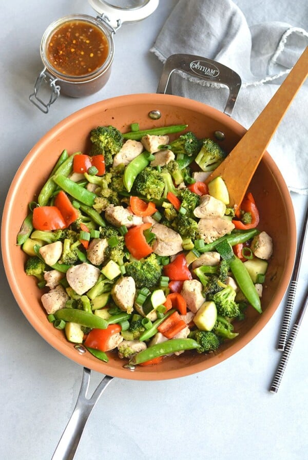 Clean Out The Fridge Chicken Veggie Stir Fry! Add any leftover veggies from the fridge, toss in chicken and soy free stir-free sauce for a quick and delicious meal! Naturally gluten fee and lower in carbs. Gluten Free + Paleo + Low Calorie
