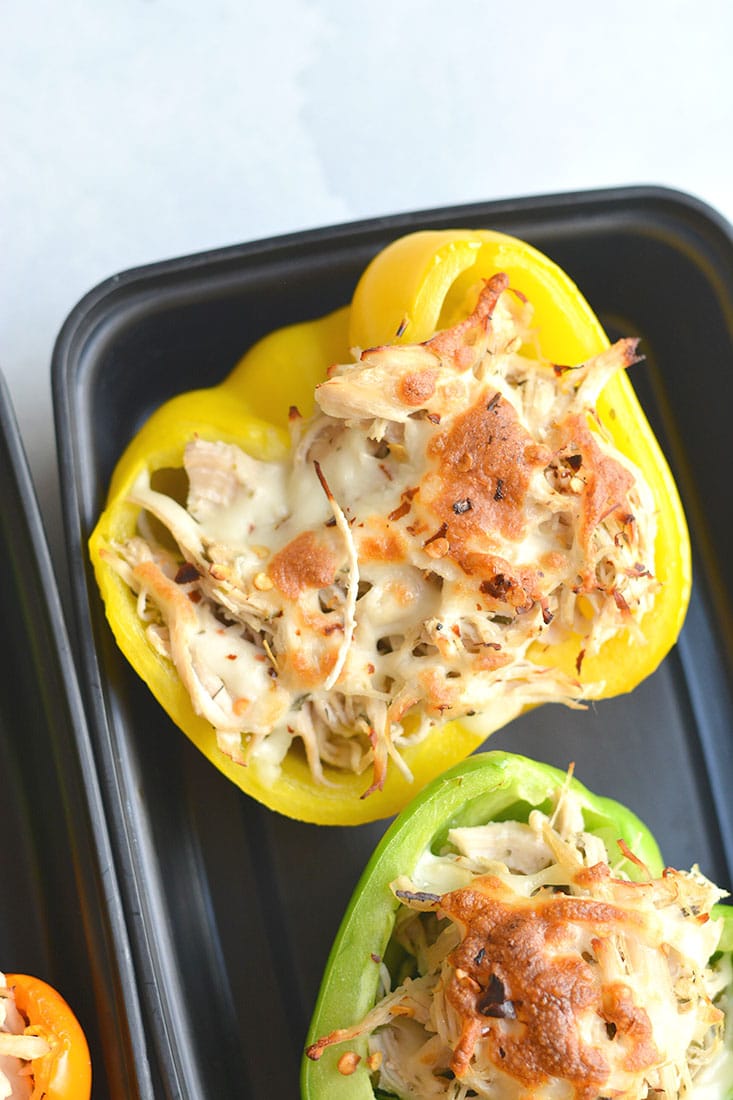 Meal Prep Chicken Philly Cheesesteak! This low carb recipe makes juicy and flavorful shredded chicken in an Instant Pot in 30 minutes and broils it in bell peppers with a touch of cheese on top! An easy, lunch or dinner to make ahead. Low Carb + Gluten Free + Low Calorie