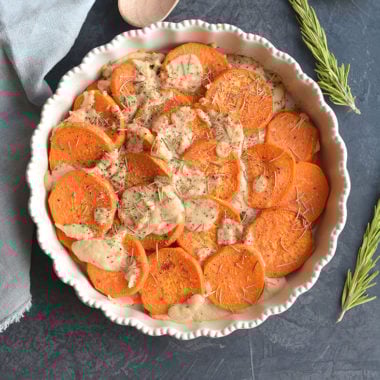 Whole30 Sweet Potato Au Gratin are sweet potatoes drizzled in a dairy-free cashew "cream" sauce. This Vegan and Paleo dish makes an easy side dish to a family dinner or a delicious to your holiday table.