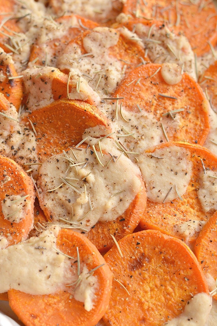 Whole30 Sweet Potato Au Gratin are sweet potatoes drizzled in a dairy-free cashew "cream" sauce. This Vegan and Paleo dish makes an easy side dish to a family dinner or a delicious to your holiday table. 