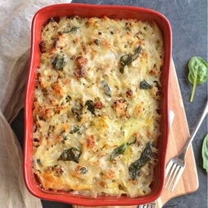 Chicken hash brown casserole on a table to serve.