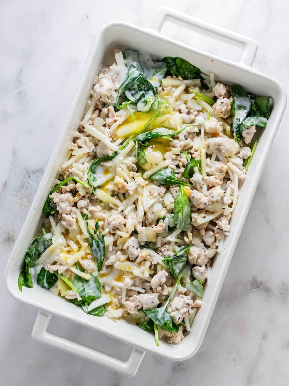 All the ingredients transfered to a baking dish to cook.